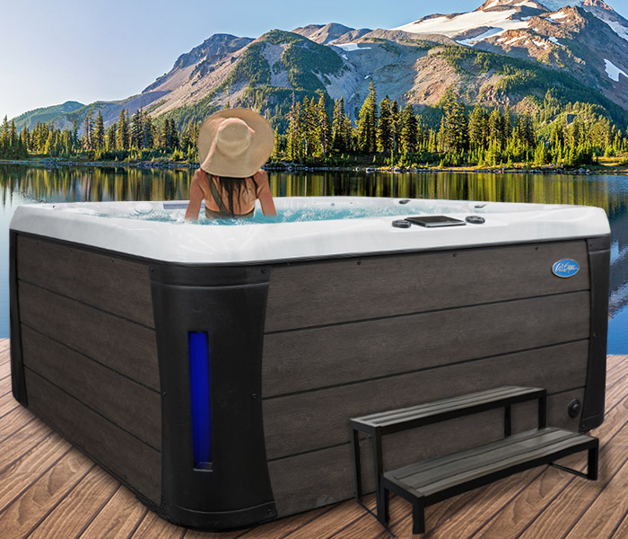 Hot Tubs, Spas, Portable Spas, Swim Spas for Sale  Calspas hot tub being used in a family setting
