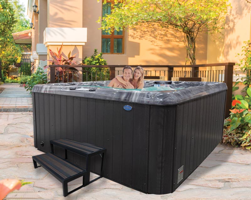 Hot Tubs, Spas, Portable Spas, Swim Spas for Sale Hot Tubs, Spas, Portable Spas, Swim Spas for Sale Calspas hot tub being used in a family setting