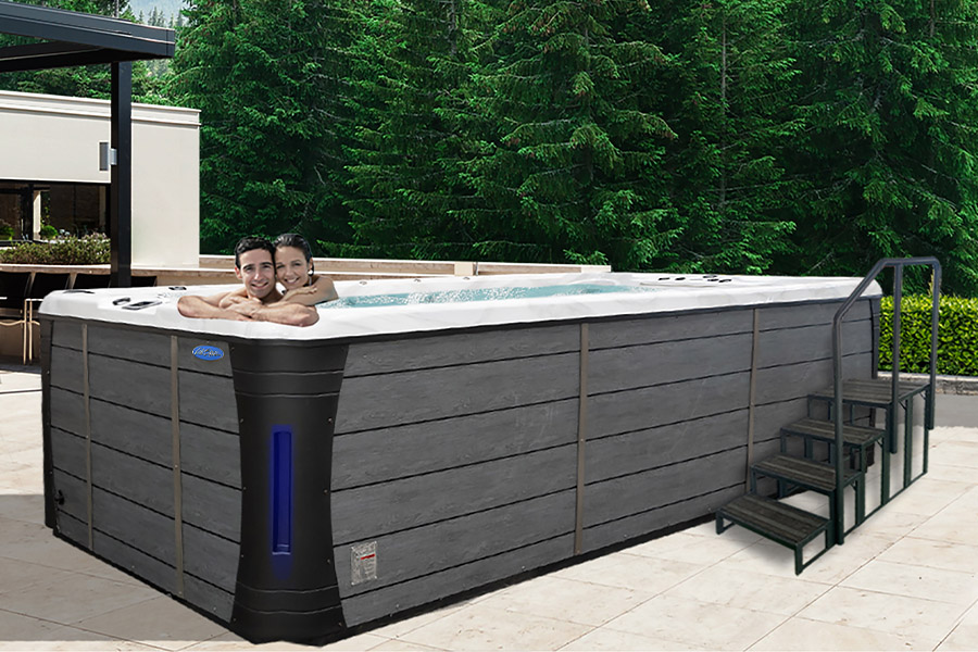 Hot Tubs, Spas, Portable Spas, Swim Spas for Sale Hot Tubs, Spas, Portable Spas, Swim Spas for Sale Calspas hot tub being used in a family setting