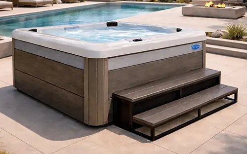 Parents and child in a Cal Spas Patio Plus hot tub